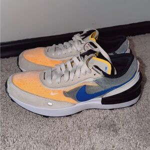 Nike Sneakers with Blue and Orange Accents